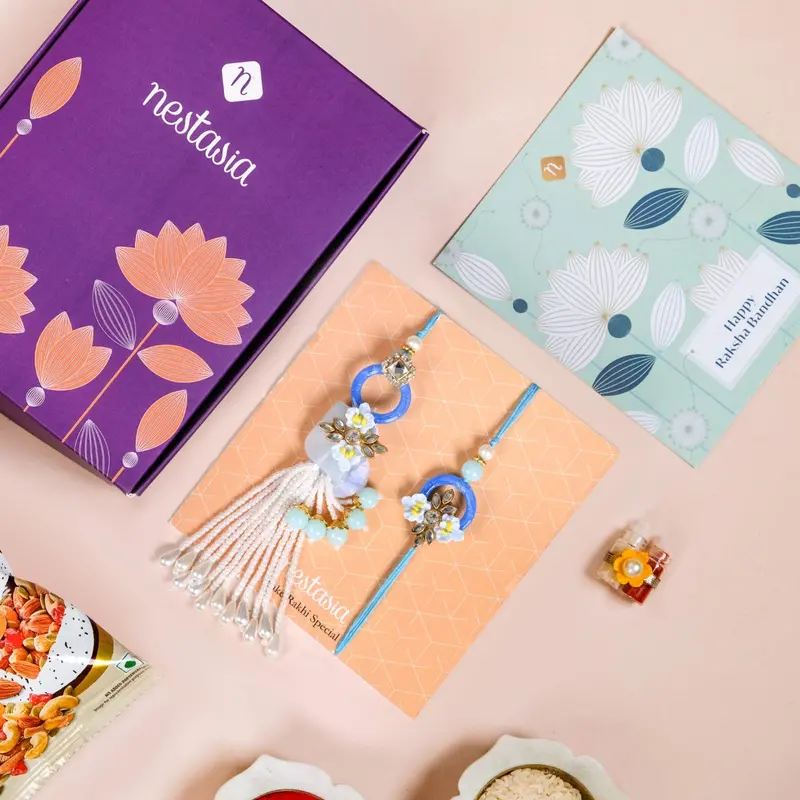 Blue-Themed Bloom Bond Rakhi Lumba Set – Festive & Elegant 1