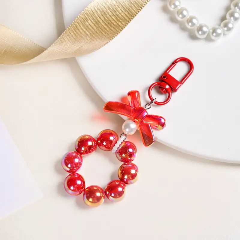 Crimson Metallic Glimmer Keychain – Playful & Compact 1