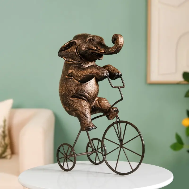 Cycling Elephant Figurine – Playful Animal-Themed Decor 1