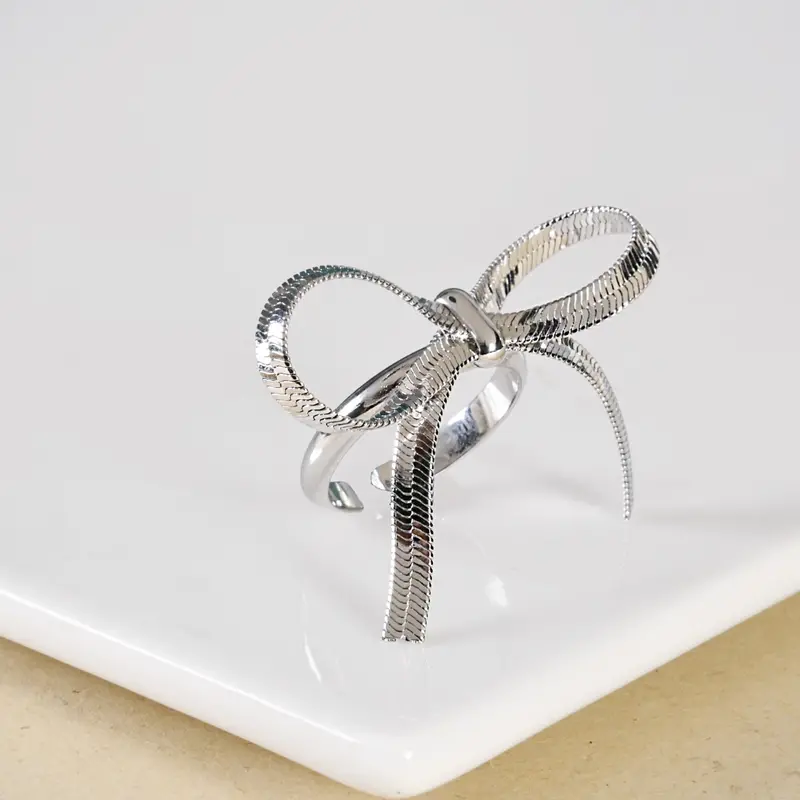 Delicate Silver Whimsy Bow Ring 1