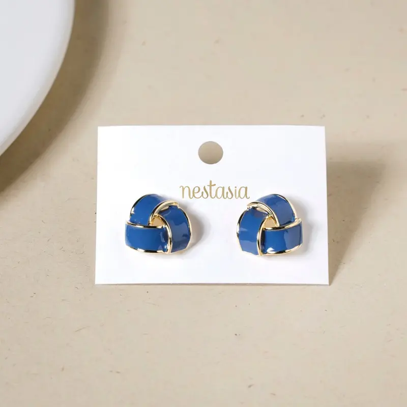Geometric Blue-And-Gold Triangular Studs 1
