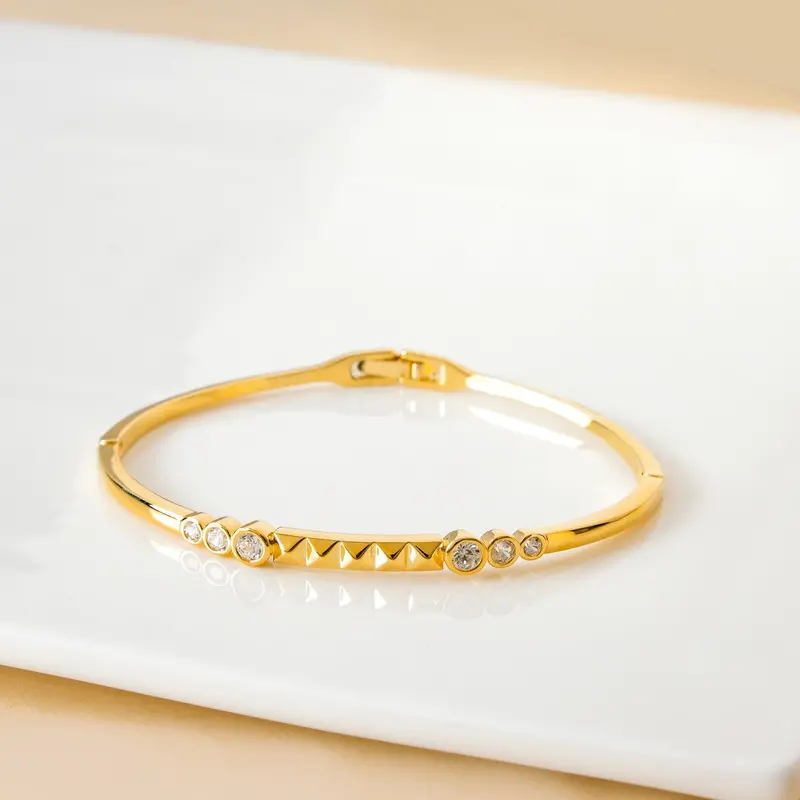 Geometric Diamond-Embellished Gold Statement Bracelet 1