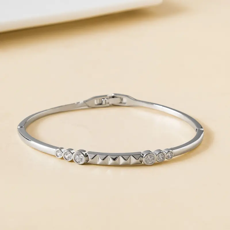 Geometric Diamond-Embellished Silver Statement Bracelet 1