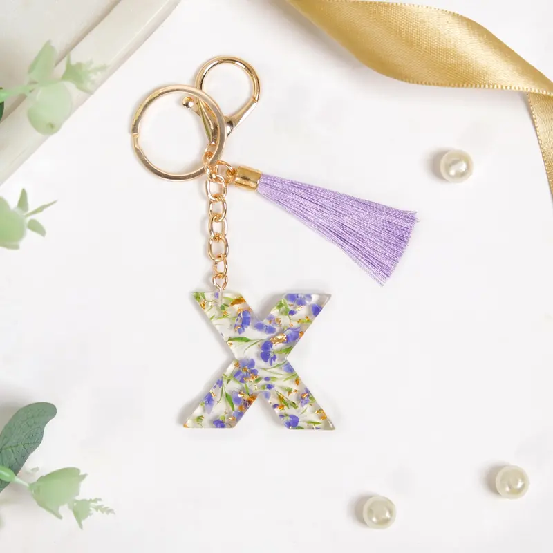 Lush Botanic Beauty Resin Keyring With Tassel Detail 1