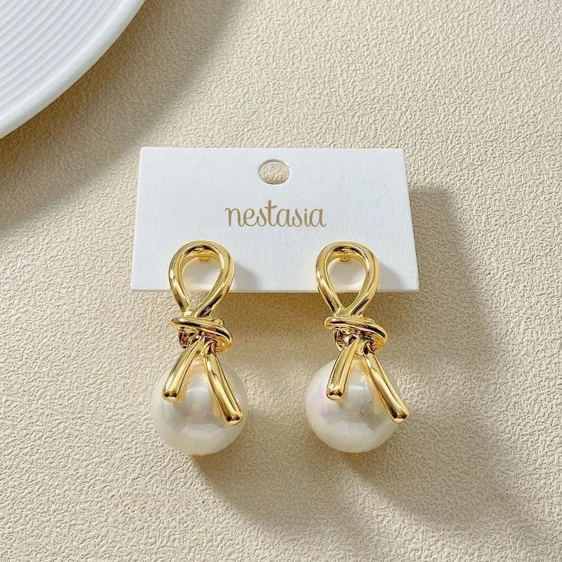 Lustrous Pearl Knot Gold Drop Earrings 1