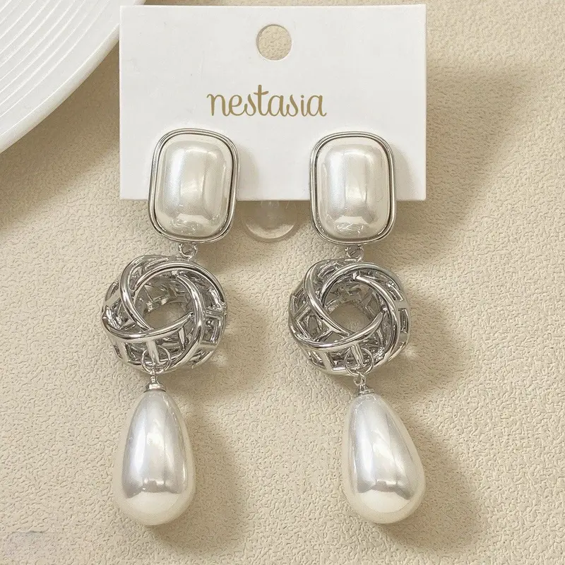 Overlapping Pearl And Silver Ring Danglers 1