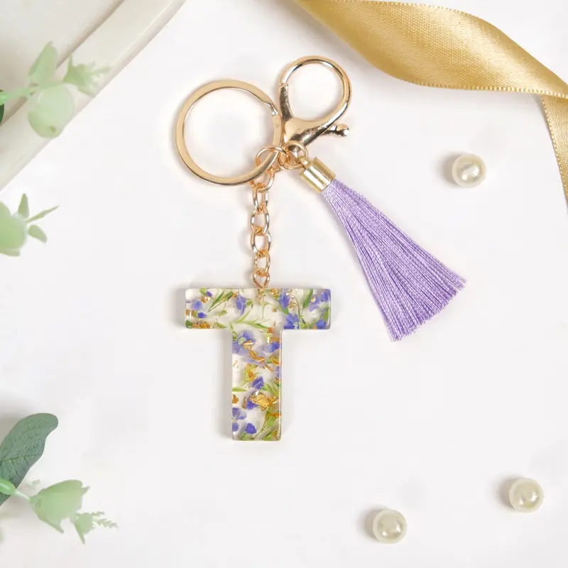 Petals And Gold Flecks T Initial Resin Keyring 1