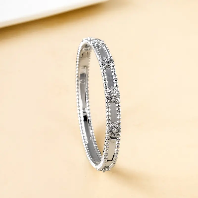 Silver Bloom Metal Bangle – Sleek Botanical-Inspired Bracelet 1
