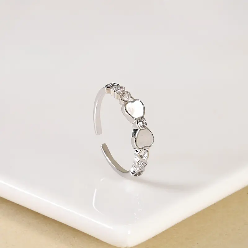 Silver Bow-And-Hearts Accent Ring 1