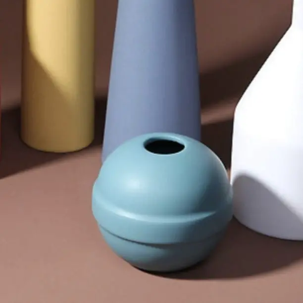 Teal-Colored Round Decorative Vase 1
