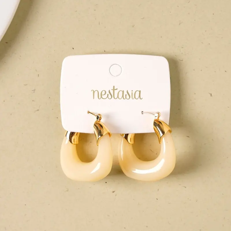White-And-Gold Huggie Hoop Earrings – Dual-Tone Seamless Curve 1